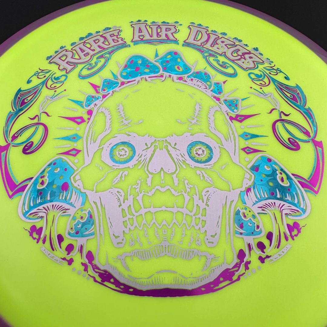 Fission Defy Crushin' Amanitas VIP 2.0 disc golf disc by Rare Air Discs, featuring vibrant design and durable construction.