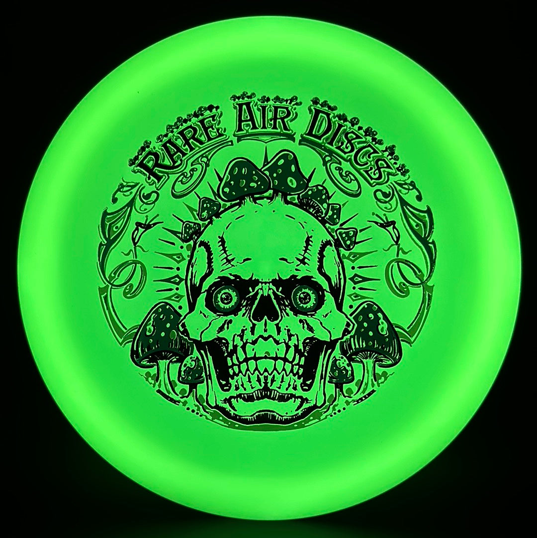 Forged Radiant Era Crushin' Amanitas disc golf stamp by Manny Trujillo on Rare Air Discs disc golf disc, featuring vibrant, detailed artwork.