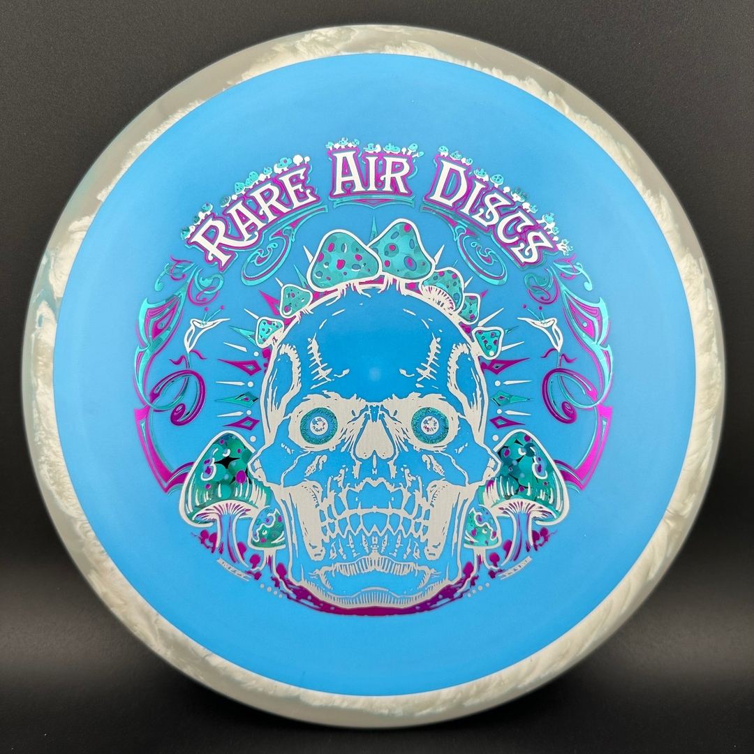 Fission Defy Crushin' Amanitas VIP 2.0 disc golf disc by Rare Air Discs, featuring vibrant design and durable flight surface.