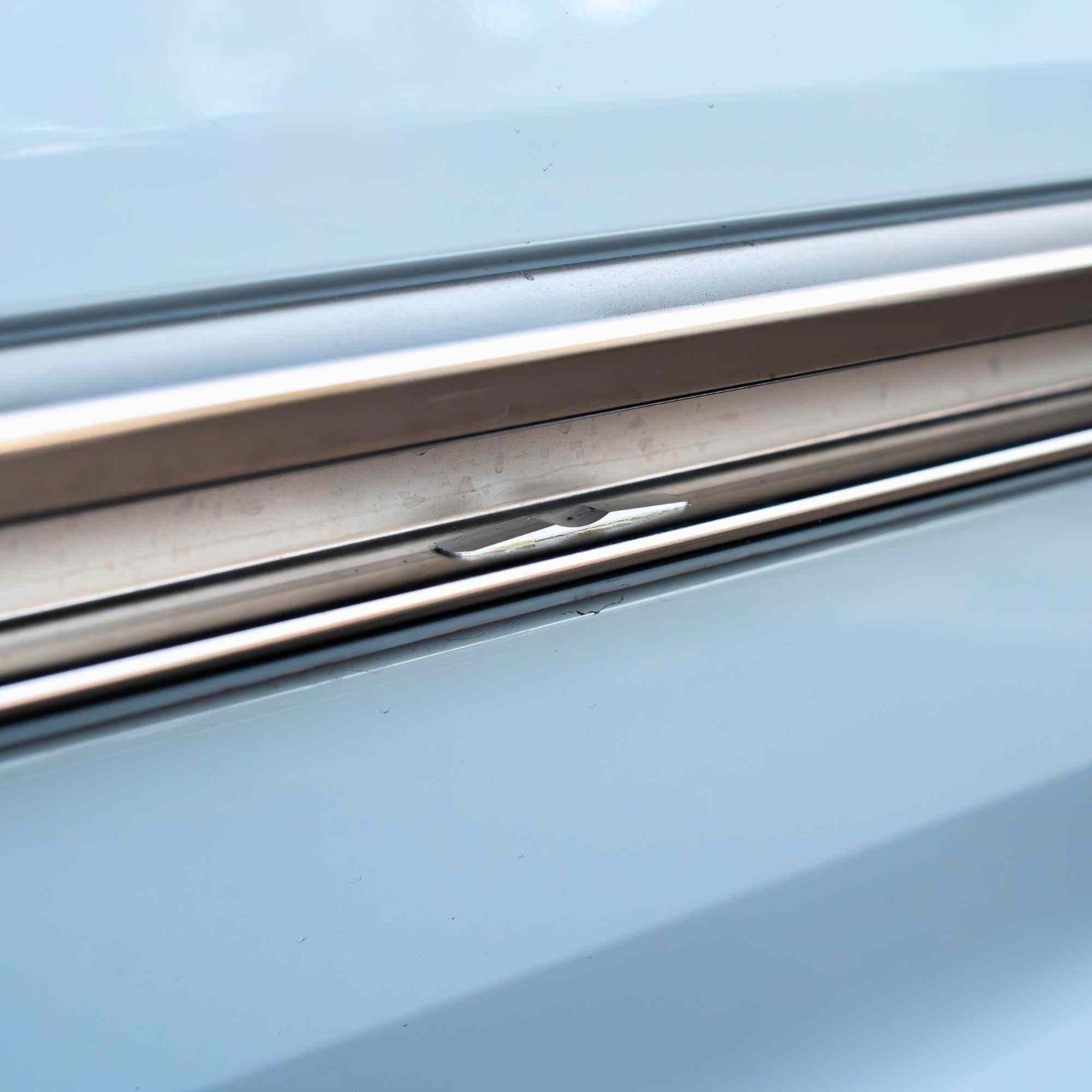 Universal Mid-Door Slider Kit by The Van Mart, showcasing durable sliding mechanism and installation components.