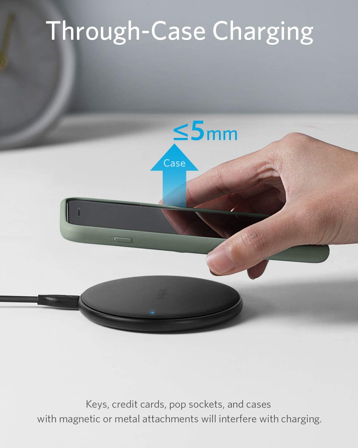 Anker 313 Wireless Charger pad with sleek design and charging surface for smartphones and compatible devices.
