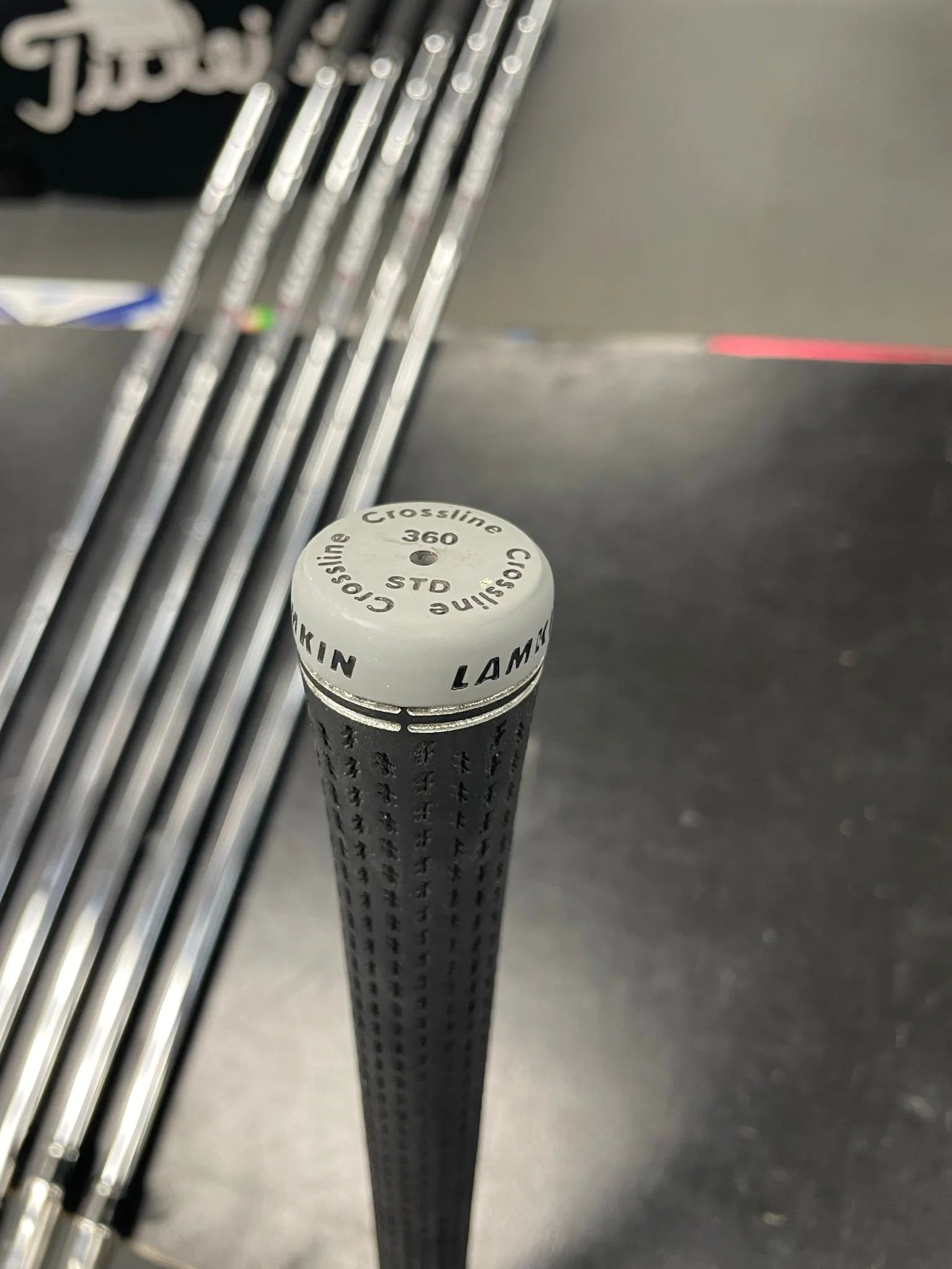Used Callaway Paradym Ai Smoke Max Fast Iron Set with six irons, showing shiny club heads and grips on a neutral background.