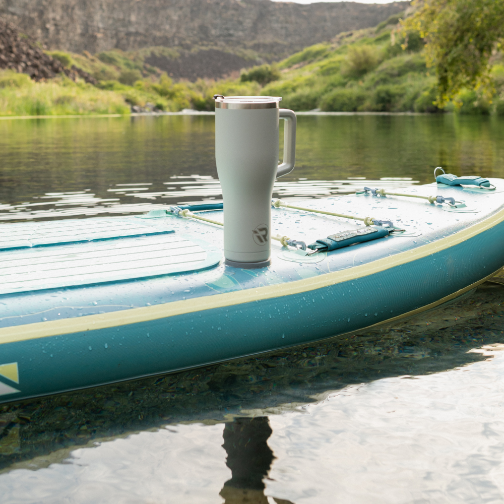 iROCKER US MAG CUP featuring a sleek design and magnetic attachment, ideal for holding beverages securely on surfboards or paddle boards.