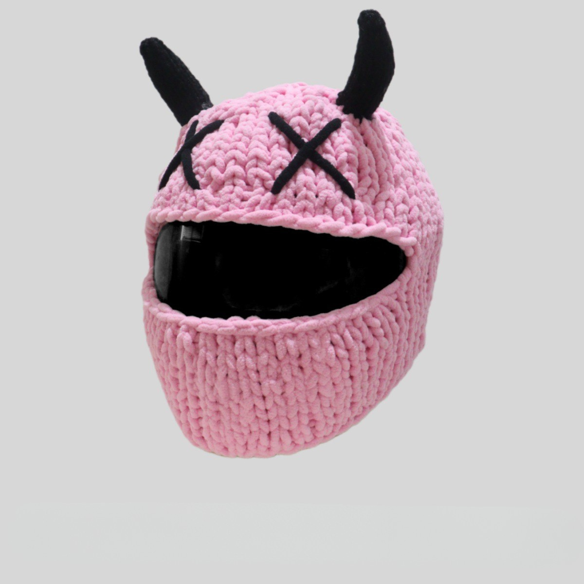 Handmade knitted Little Devil helmet cover by Bean's Moto Booth, featuring red devil horns and detailed stitching for motorcycle helmet accessories.
