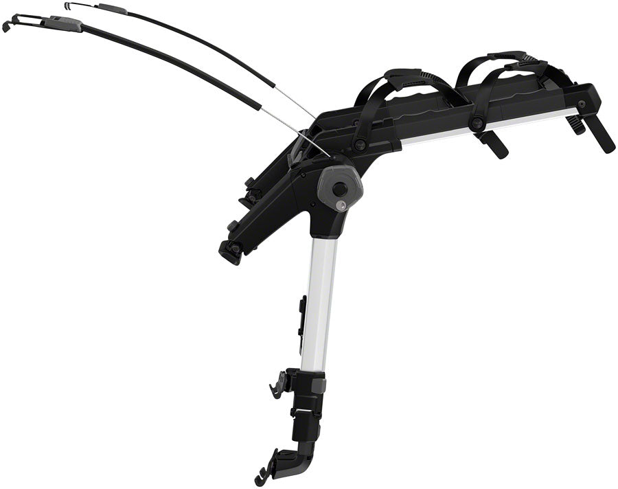 Thule Outway Trunk Rack for 2 bikes mounted on a car, showcasing sturdy design and secure bike attachment features.
