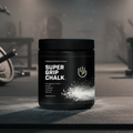 Clean Chalk Super Grip Magnesium Carbonate sports chalk powder in a container, used for enhanced grip during climbing or weightlifting.