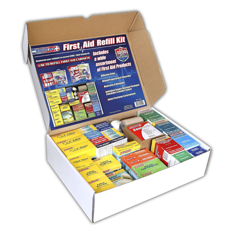 XL Rapid Care First Aid Refill Kit with 1033 pieces arranged on four shelves for easy access and organization.
