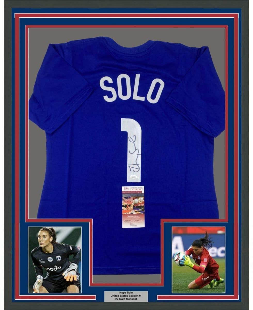 Framed Autographed/Signed Hope Solo 35x39 United States USA Blue Soccer Jersey JSA COA - OVERLANDERS Outfitter