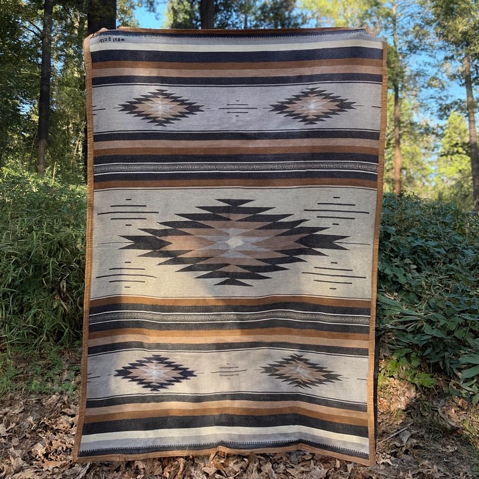 West Path waxed canvas camping blanket, outdoor throw blanket with durable, water-resistant fabric for bushcraft and camping adventures.