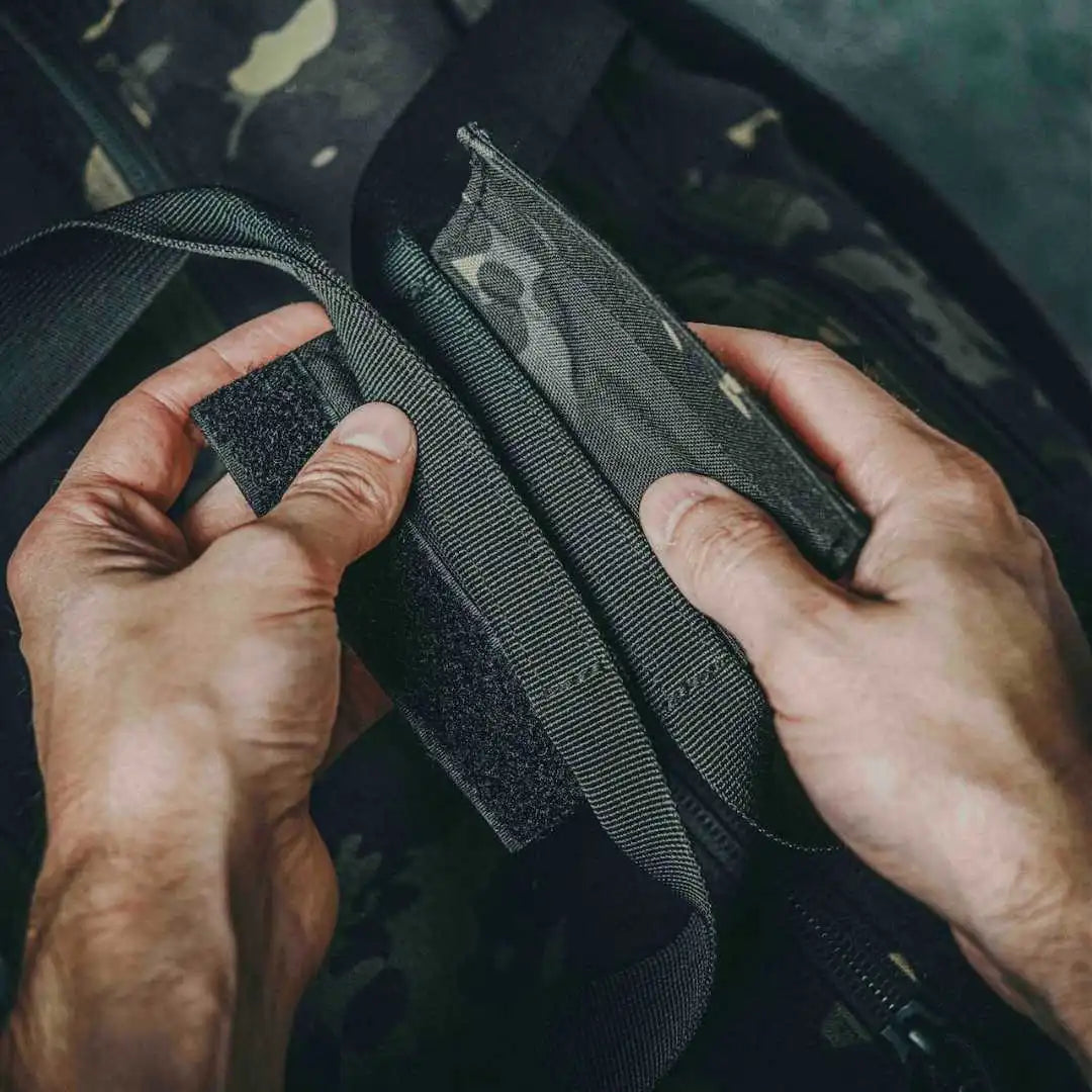 Recycled Firefighter 72-Hour 500D Cordura duffle bag with black MCAM fabric, featuring sturdy handles and spacious design.