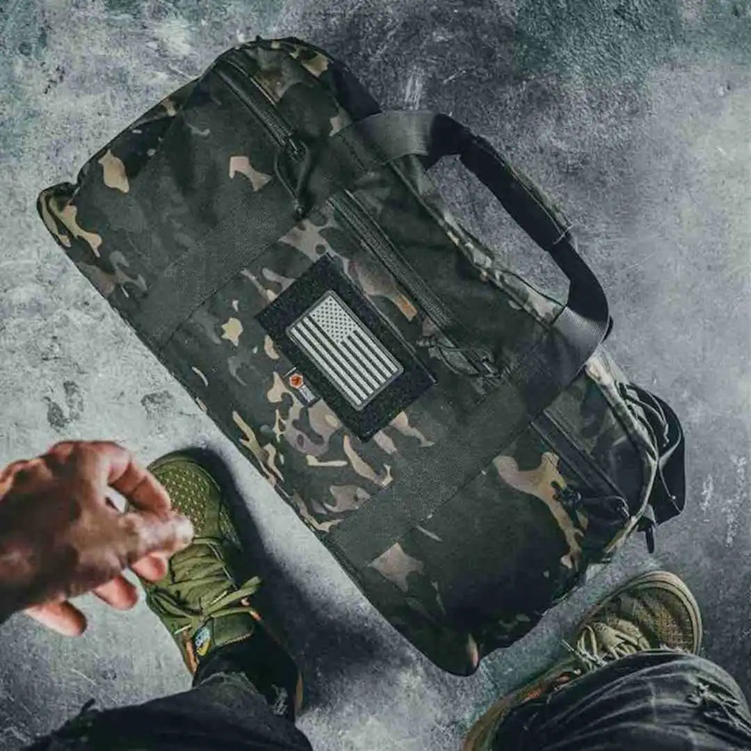 Recycled Firefighter 72-Hour 500D Cordura duffle bag in MCAM black, designed as a durable backpack with sturdy straps.