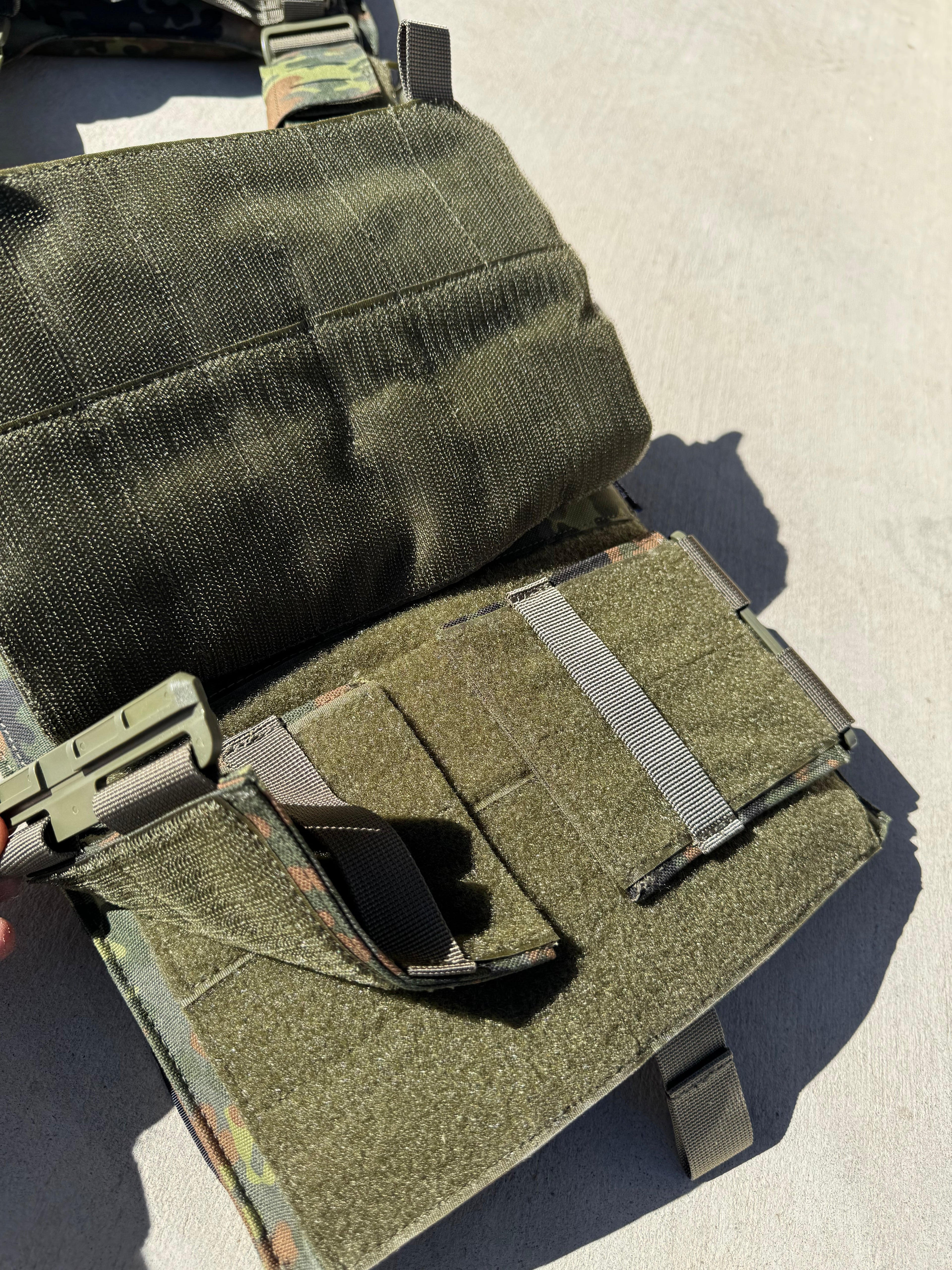 Redemption Tactical Crusader 2.0 V4 plate carrier vest with adjustable straps and front MOLLE webbing for tactical gear.