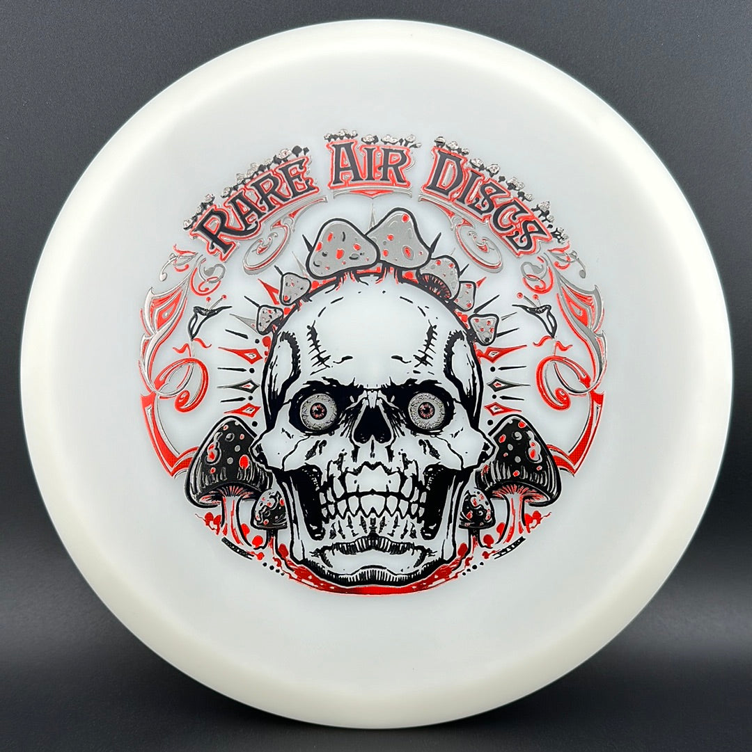 Forged Radiant Supra disc golf stamp by Manny Trujillo on Rare Air Discs, featuring crushin' Amanitas design.