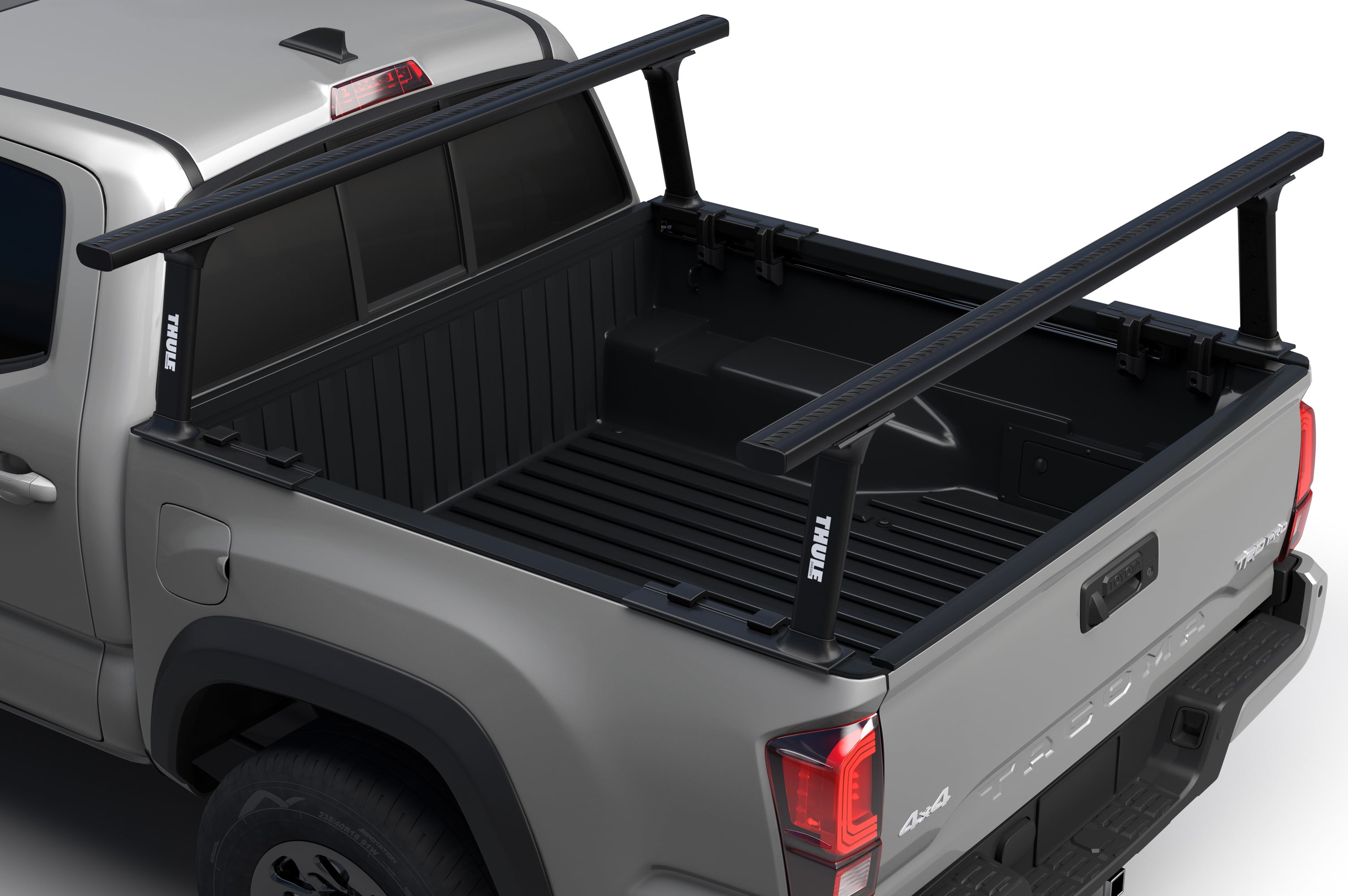 Backcountry Sportsman Thule Xsporter Pro Mid roof racks mounted on a vehicle for carrying outdoor gear and equipment.