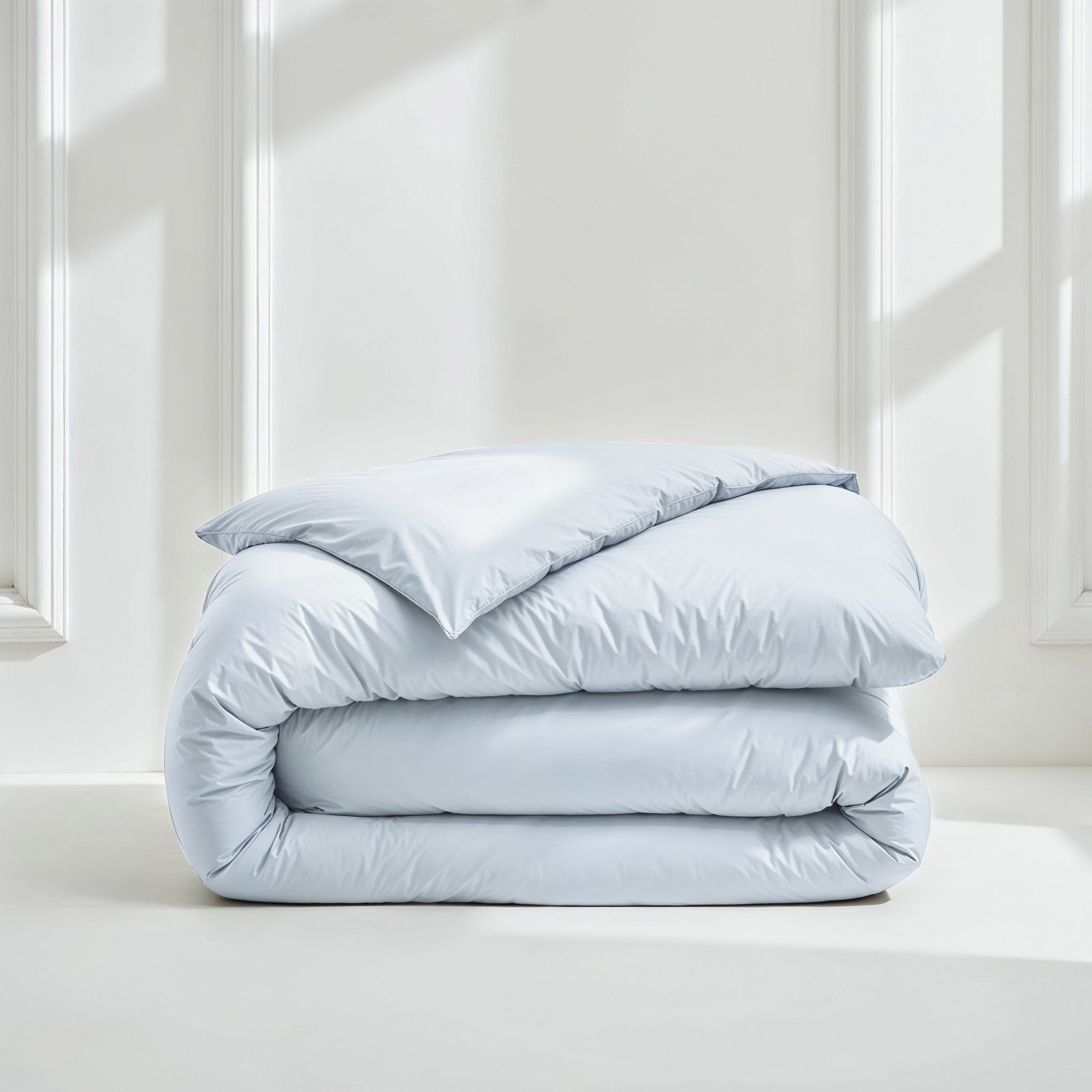 Elegant Luxe Australian Sateen Duvet Cover from Italic, showcasing smooth, shiny fabric and clean stitching on a neatly made bed.