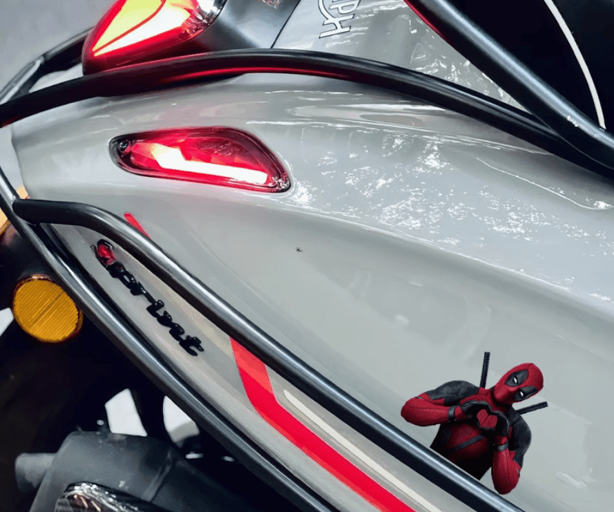 Deadpool motorcycle decorative stickers featuring bold, colorful designs from Bean's Moto Booth, perfect for customizing bikes.