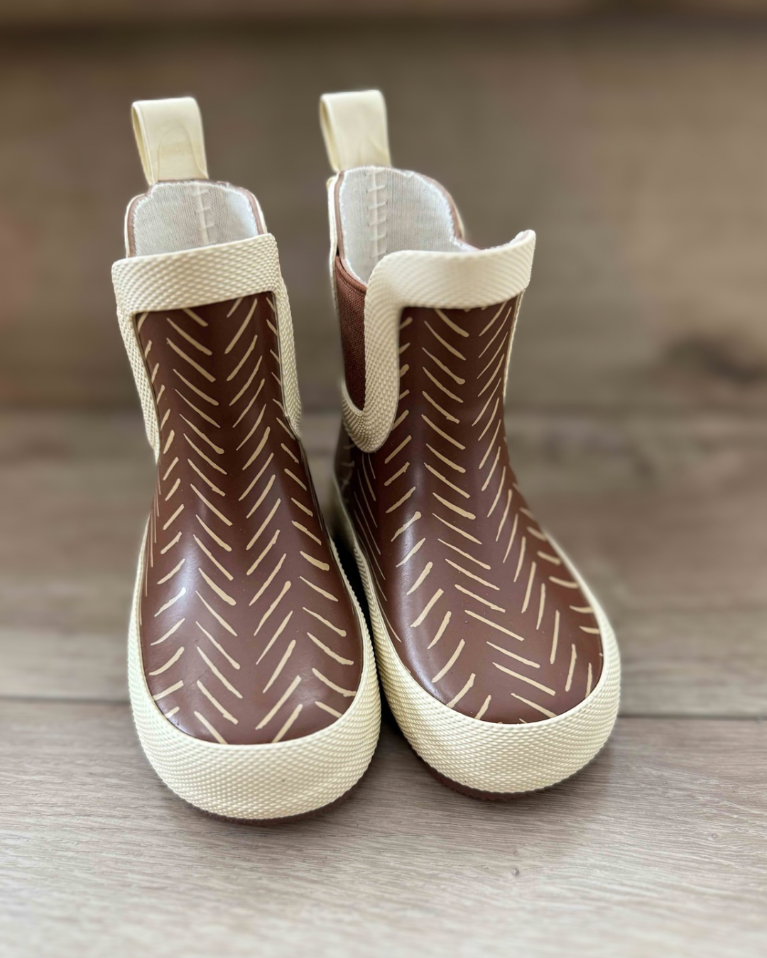 Keep the Littles Wild Summit Rain Boots in vibrant colors with waterproof design, perfect for wet weather and outdoor adventures.