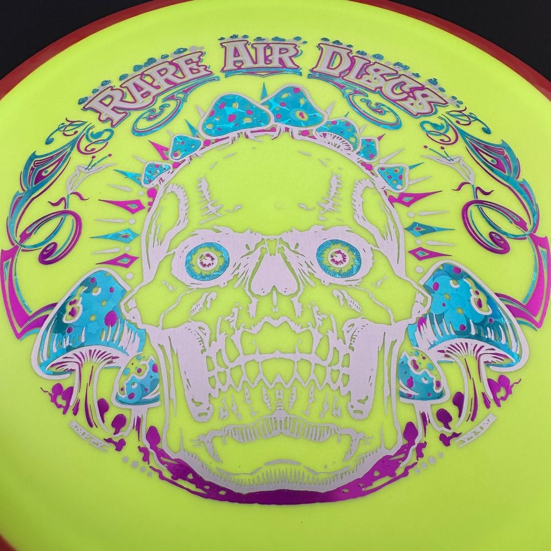 Fission Defy Crushin' Amanitas VIP 2.0 disc golf disc by Rare Air Discs, featuring vibrant artwork and aerodynamic design.