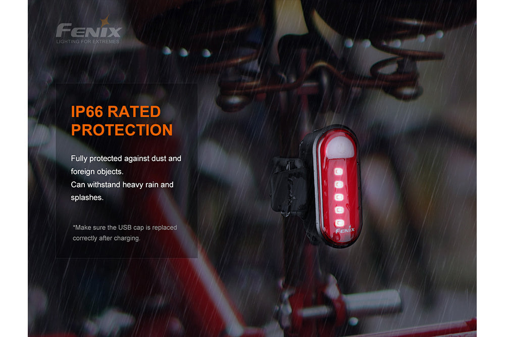 Fenix BC05R V2.0 rechargeable bicycle tail light with a red LED visible on a bike, showcasing its compact design.