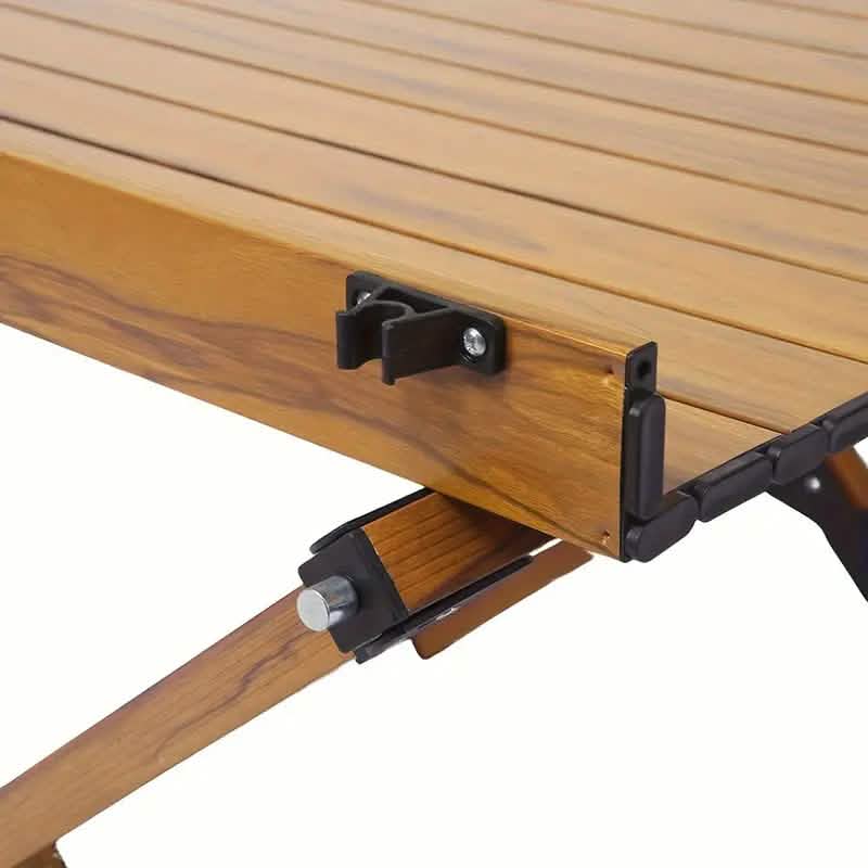 Portable picnic table for outdoor recreation by DailySale, showing a compact wooden table with attached benches on a grassy field.
