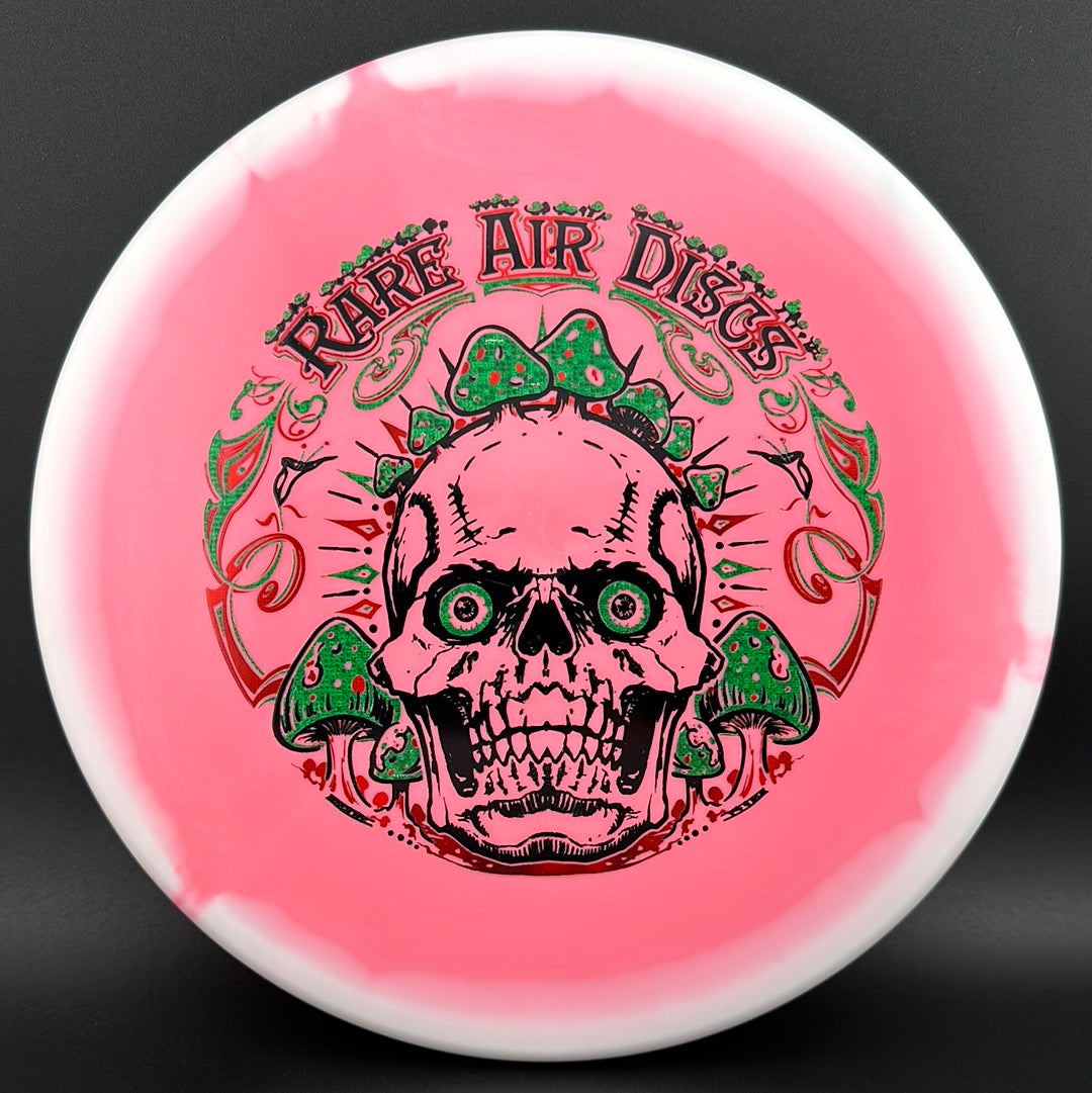 Halo S-Blend Tomb disc golf stamp by Manny Trujillo featuring Crushin' Amanitas design on a Rare Air Discs disc.