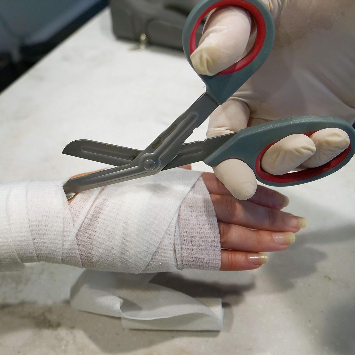 Premium titanium bonded EMT shears by Agreeable Agony, featuring safety blades and ergonomic handles for trauma care.