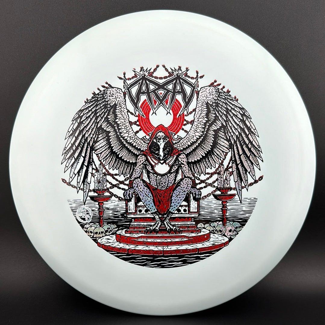ESP Glo Buzzz disc golf disc by Rare Air Discs, featuring Karudi the Overseer artwork on a luminous glow disc.