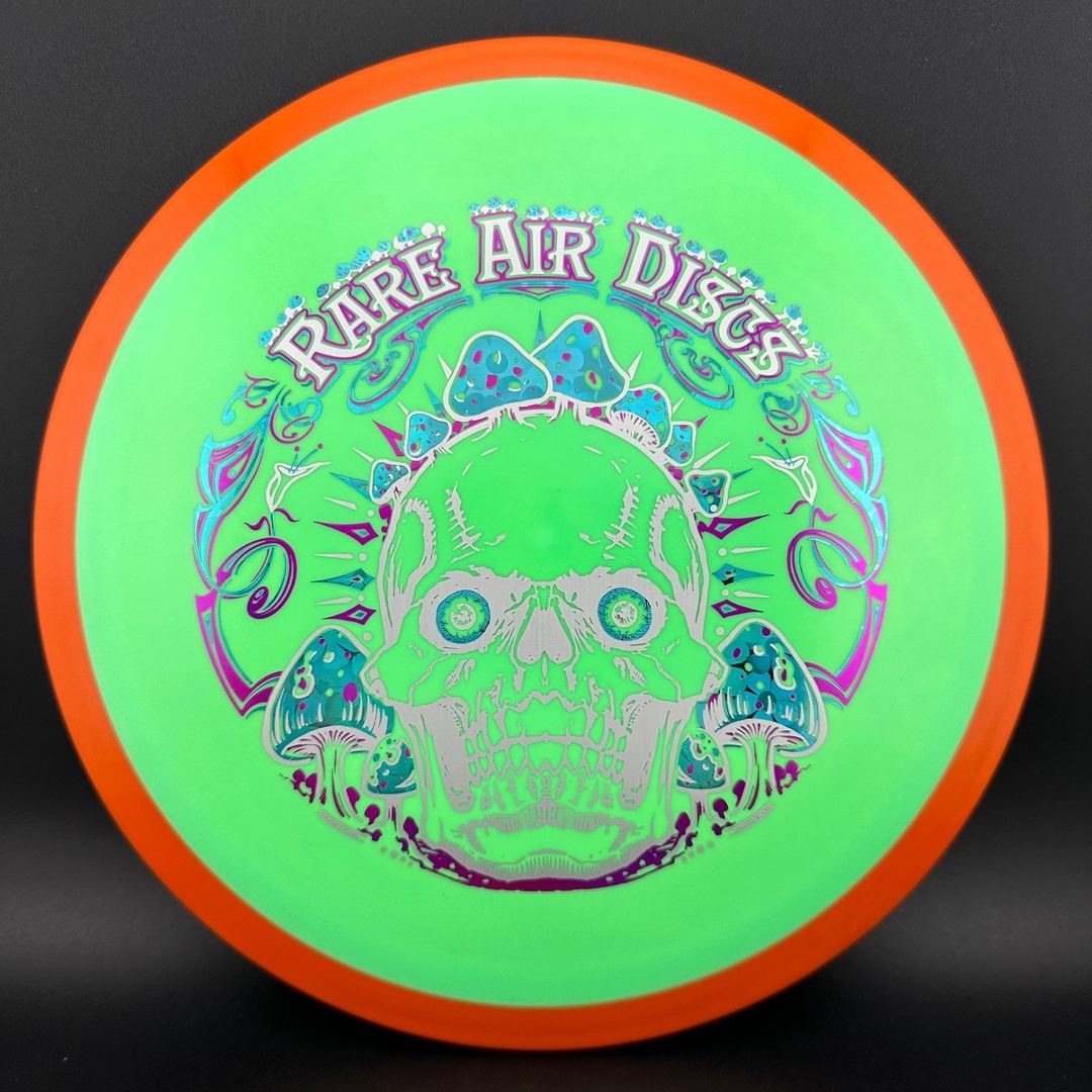 Fission Defy Crushin' Amanitas VIP 2.0 disc golf disc by Rare Air Discs, featuring vibrant design and durable plastic.