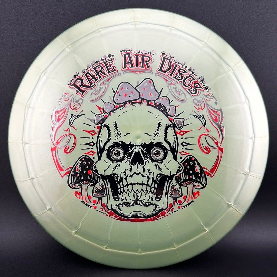 Ethereal Construct Crushin' Amanitas disc golf stamp by Manny Trujillo on a Rare Air Discs disc, featuring vibrant mushroom artwork.