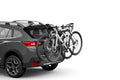 Backcountry Sportsman Thule OutWay 2 bike rack mounted on a vehicle, designed for secure transportation of two bicycles.