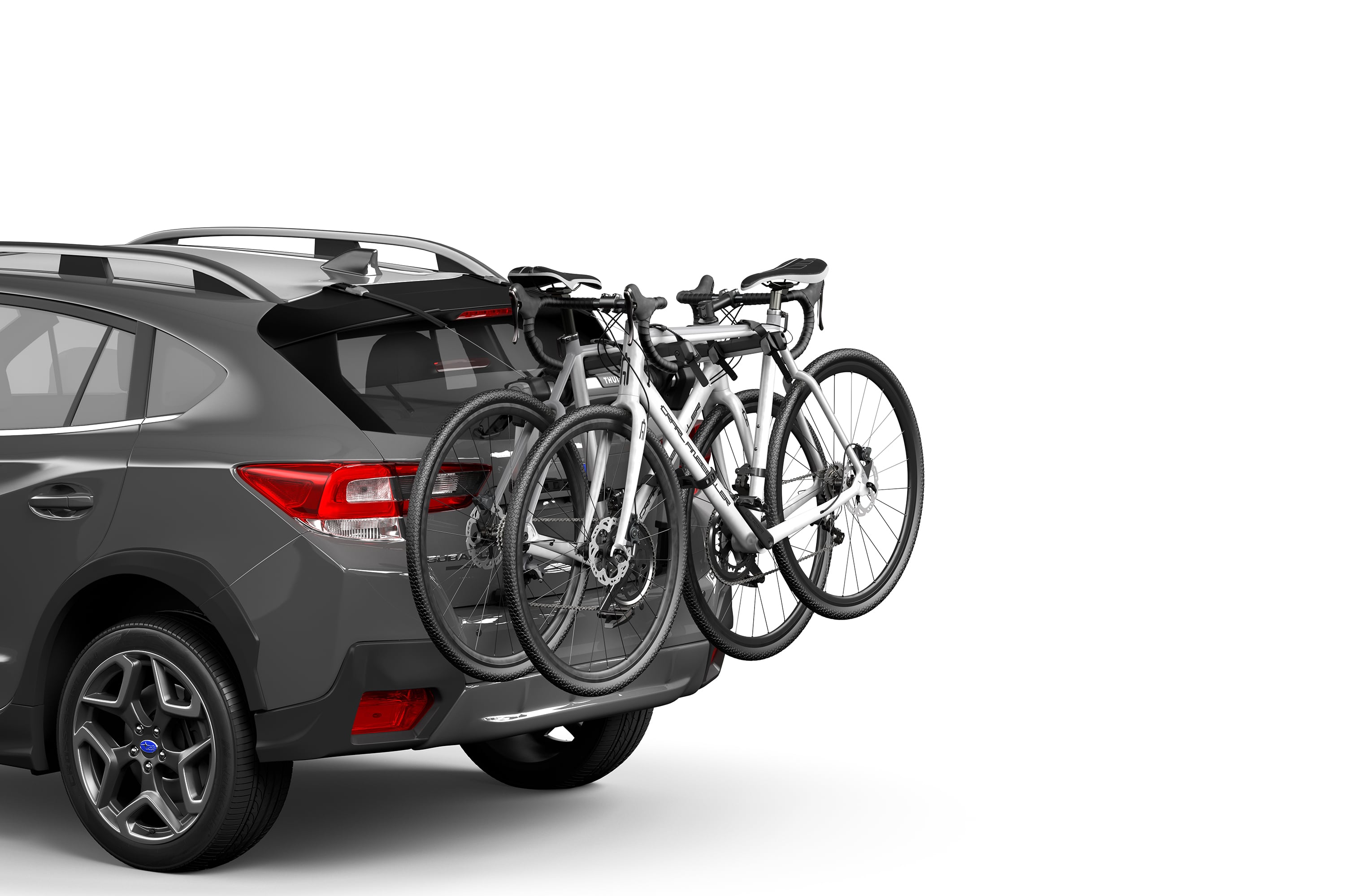 Backcountry Sportsman Thule OutWay 2 bike rack mounted on a vehicle, designed for secure transportation of two bicycles.