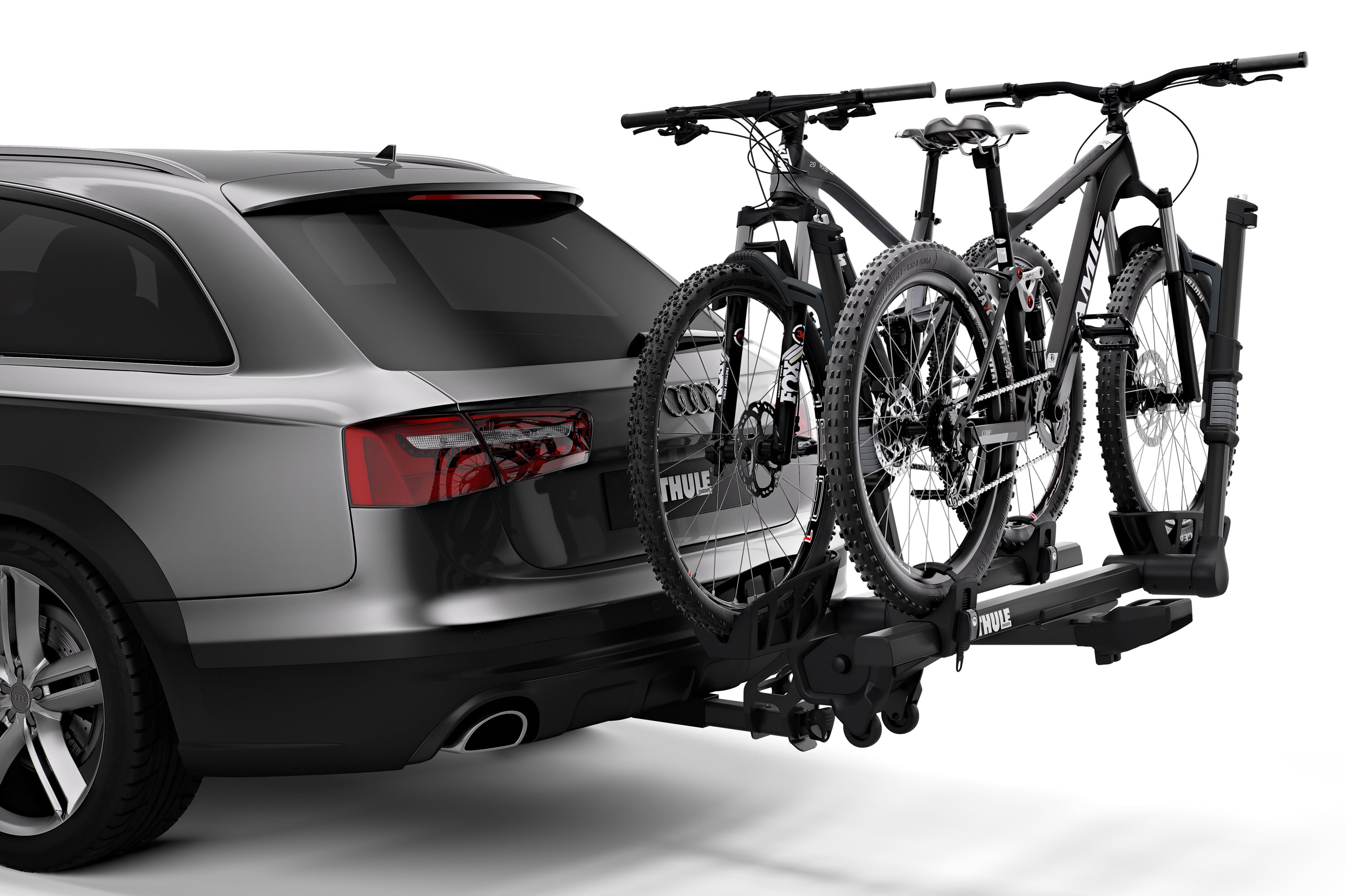Backcountry Sportsman Thule T2 Pro XTR 2 bike rack mounted on vehicle, showing its sturdy design and dual-arm locking system.