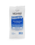 Sterile Medique ABD Pad 5" x 9" first aid supply, showcasing its white, soft surface and absorbent material.