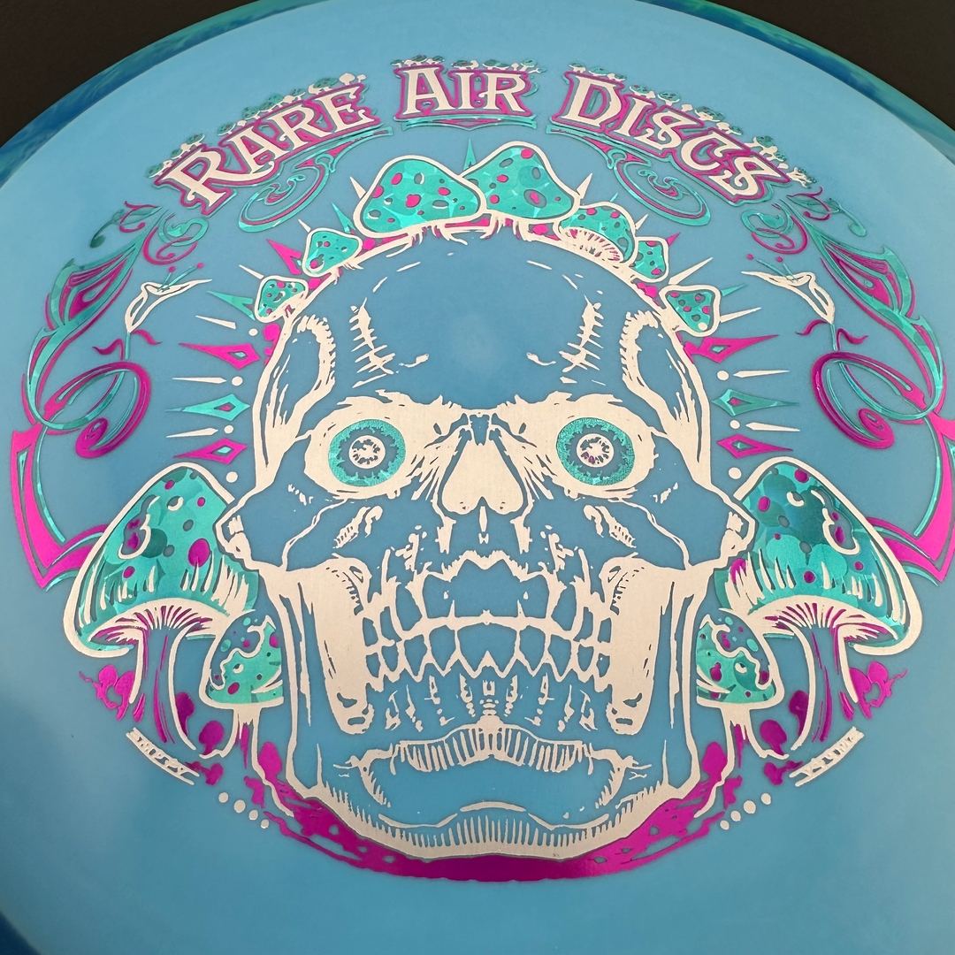 Fission Defy Crushin' Amanitas VIP 2.0 disc golf disc by Rare Air Discs, featuring vibrant artwork and durable design.
