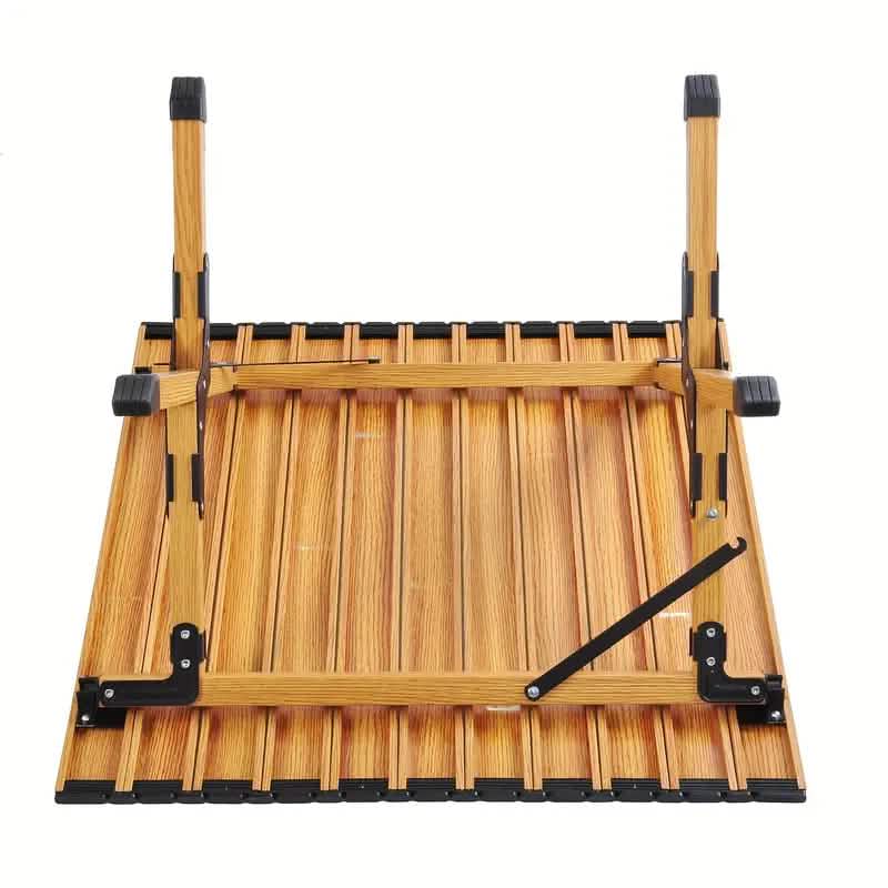 Portable outdoor picnic table by DailySale, compact and lightweight for outdoor recreation and family picnics.