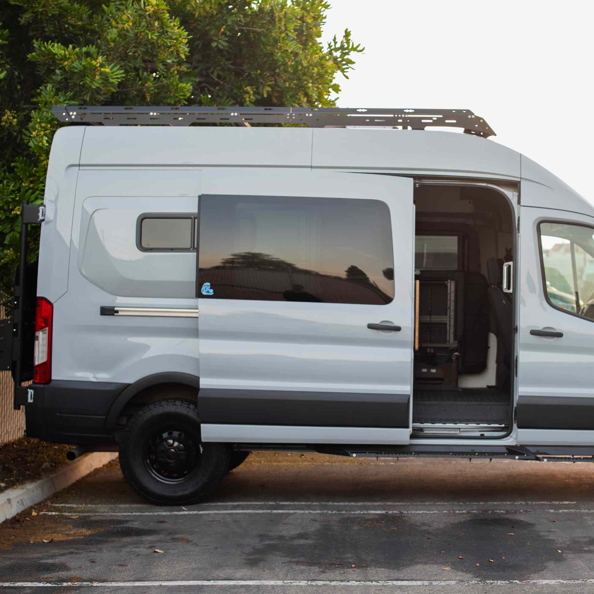 Universal mid-door slider kit from The Van Mart, showing the hardware and components for sliding door installation.