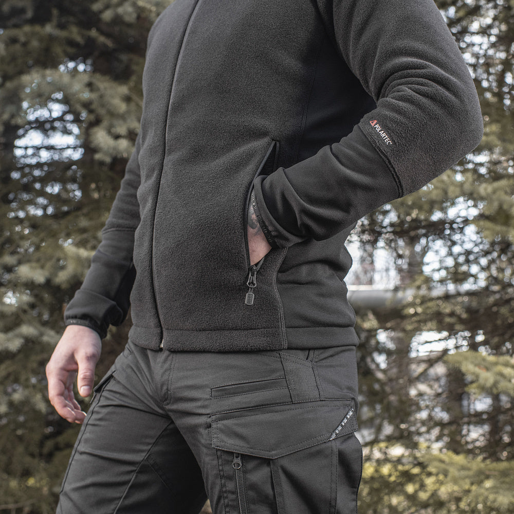 M-TAC Polartec Sport fleece jacket in dark color, featuring a zip front and comfortable fit for outdoor activities.