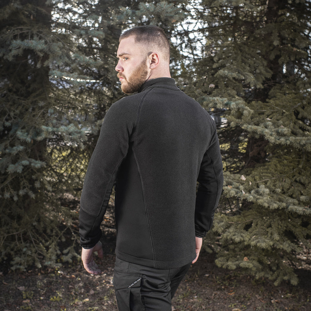 M-TAC Polartec sport fleece jacket in dark color, showcasing soft fabric and zippered front for outdoor activities.