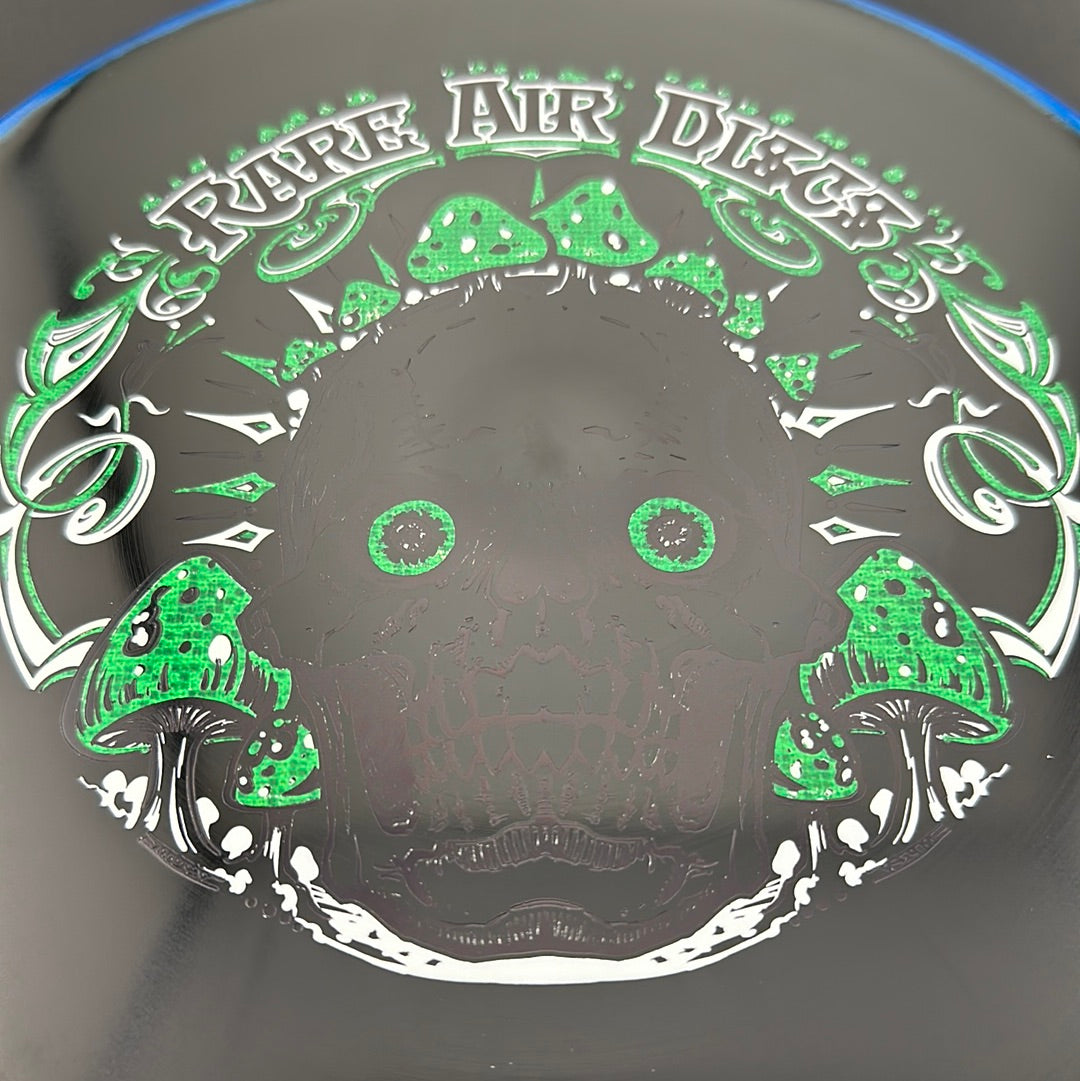 Halo S-Blend Tomb disc golf stamp by Manny Trujillo featuring Crushin' Amanitas artwork on a Rare Air Discs disc.