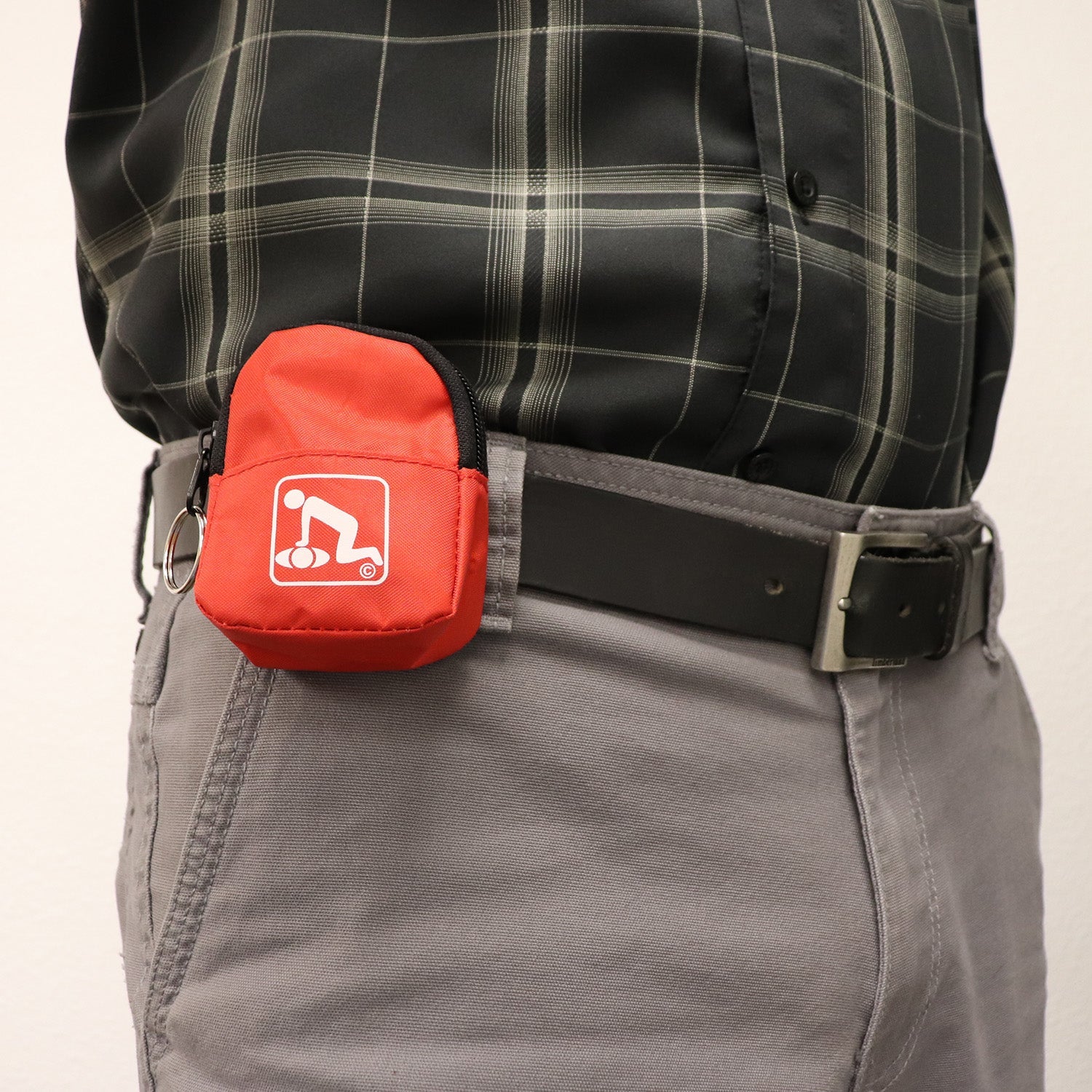 Red CPR belt loop keychain with faceshield, gloves, and cleansing wipes for emergency CPR preparedness.