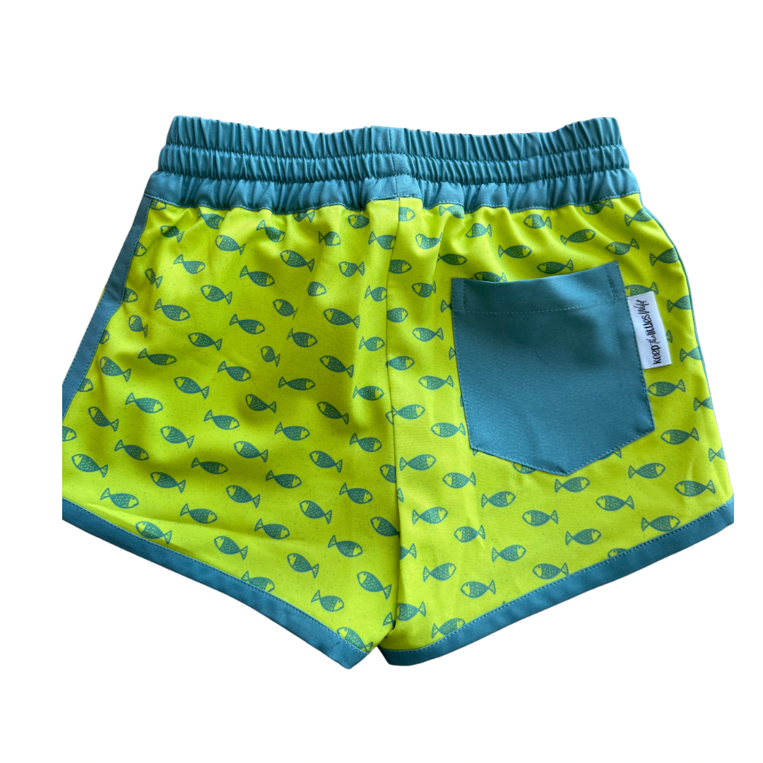Bright neon fish hybrid shorts by Keep the Littles Wild, showcasing colorful fish patterns on lightweight casual shorts.