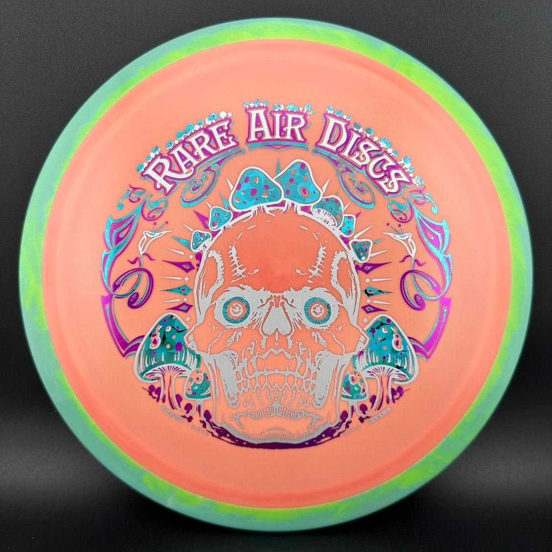 Rare Air Discs Fission Defy Crushin' Amanitas VIP 2.0 disc golf disc with colorful artwork and distinctive design.