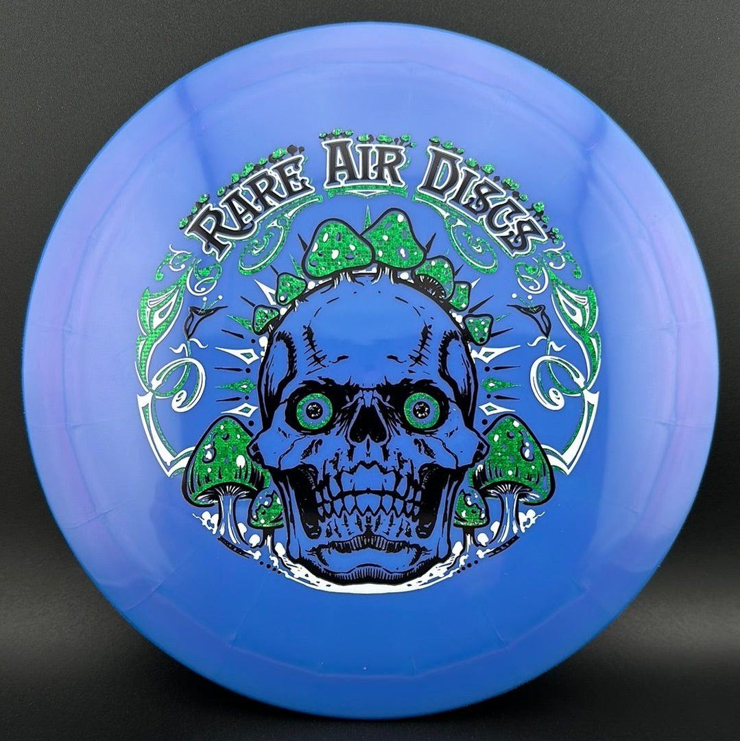 Ethereal Construct Crushin' Amanitas disc golf stamp by Manny Trujillo on Rare Air Discs disc golf disc featuring colorful mushroom design.
