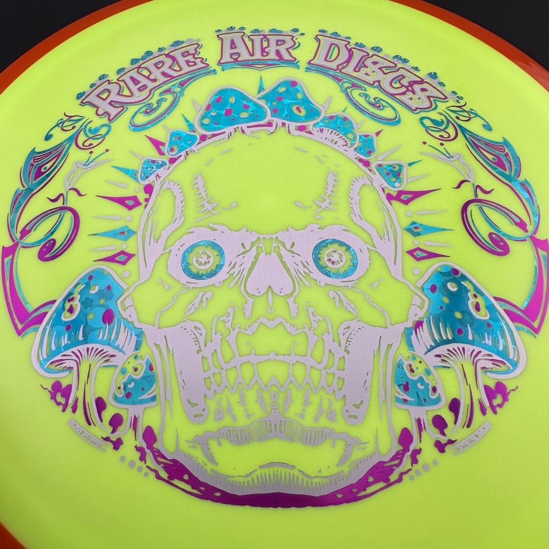 Rare Air Discs Fission Defy Crushin' Amanitas VIP 2.0 disc golf disc with vibrant design and premium plastic finish.