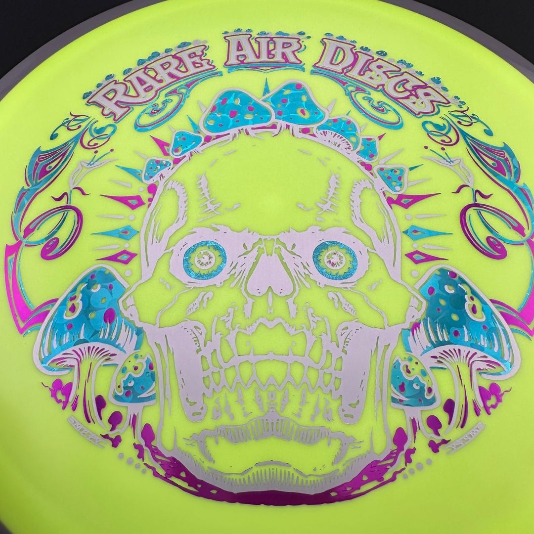 Rare Air Discs Fission Defy Crushin' Amanitas VIP 2.0 disc golf disc with vibrant design and sturdy plastic, ideal for accurate throws.