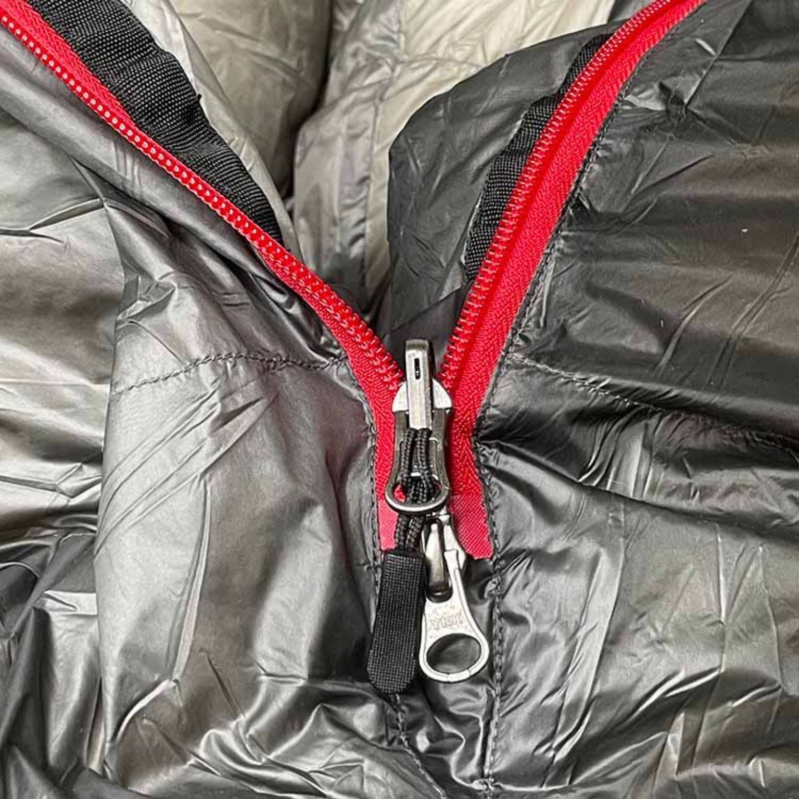 Near Zero Outdoor Gear NZ 20 Mummy Sleeping Bag in a cozy, contoured shape for warmth and comfort in outdoor settings.