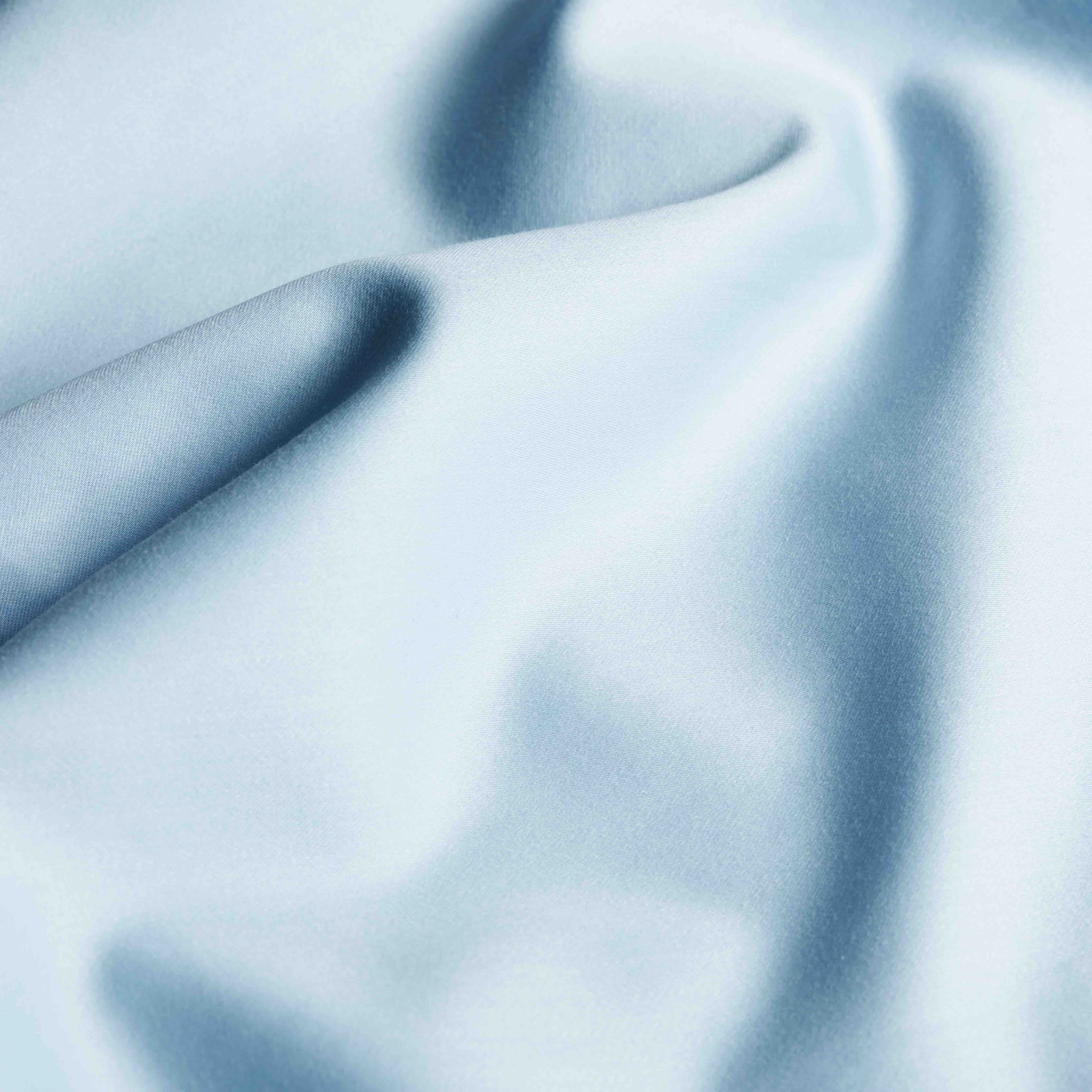 Elegant Luxe Australian Sateen Duvet Cover by Italic, soft white fabric with subtle sheen, styled on a neatly made bed.