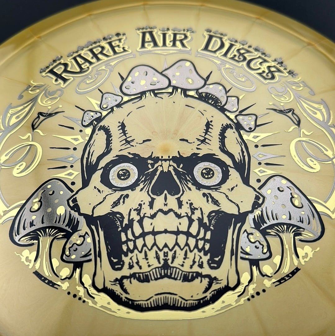 Ethereal Construct Crushin' Amanitas disc golf stamp by Manny Trujillo on a Rare Air Discs disc with vibrant, detailed mushroom and nature design.