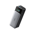 Anker 737 PowerCore 24K portable power bank for charging devices, with a sleek black design and multiple USB output ports.