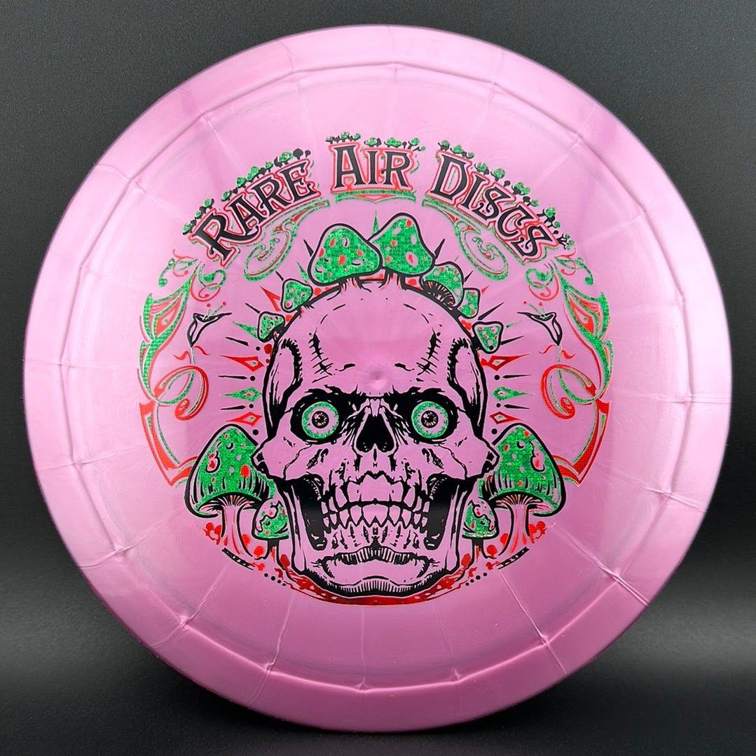 Ethereal Construct Crushin' Amanitas disc golf stamp by Manny Trujillo on a Rare Air Discs disc, featuring intricate mushroom artwork.